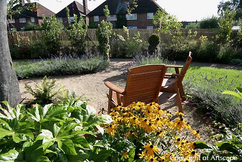 Two relaxing chairs in a sensory garden